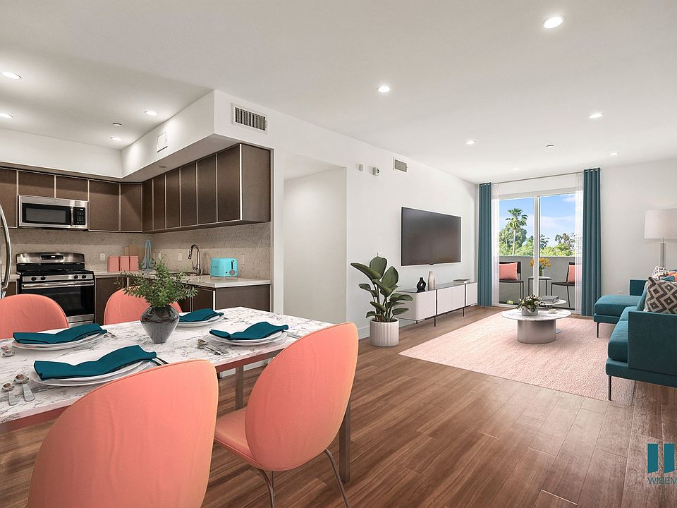 Kitchen, Dining, and Living Room Space with Patio