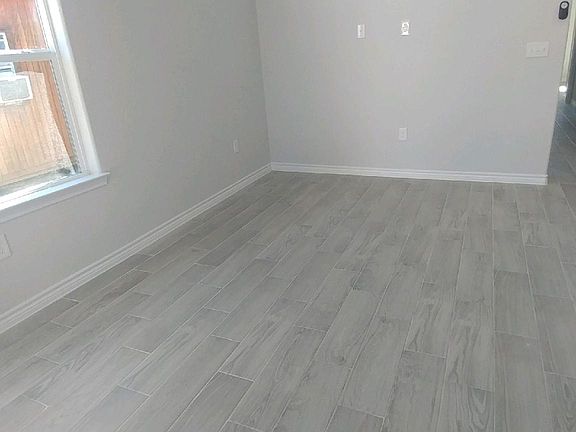 Vaulted Ceiling in Open Concept Den and Kitchen Space