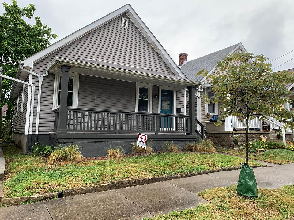 New front porch railing, surface, and steps.