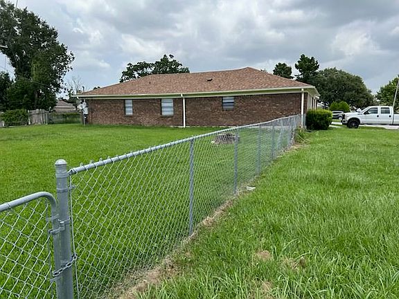 Fenced Yard Left of House
