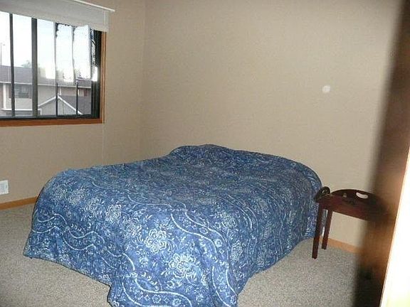 The master bedroom has a walk in closet, and is adjacent to a full bathroom