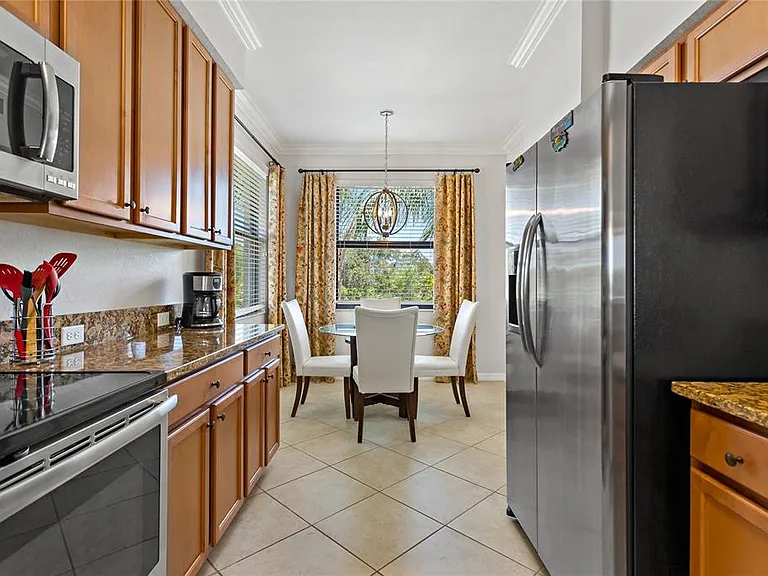 7015 River Hammock Dr #208 — Photo 29