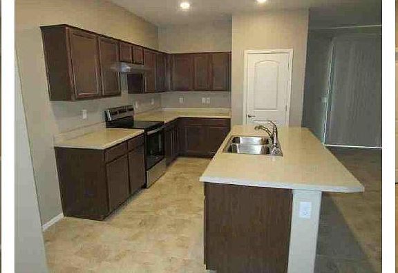 5th image of 7855 N Scholes Ave