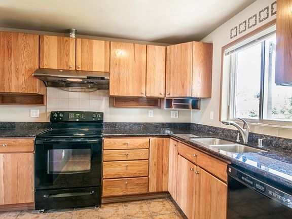 Tile floors, new cabinets and appliances in this tastefully remodeled kitchen!