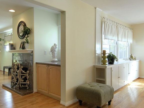 LIVING ROOM VIEW TO FAMILY AND DINING ROOMS