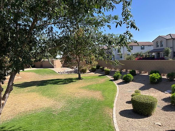 surrounded by green belts and opposite the small children's park and pool. Steps away. The perfect location for your family!