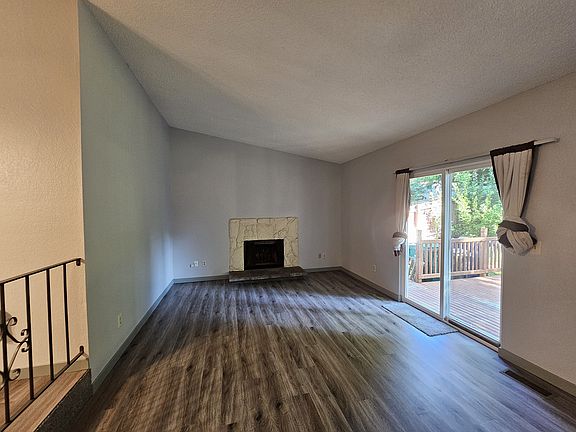 Large living room with vaulted ceilings that make the room feel extra spacious.