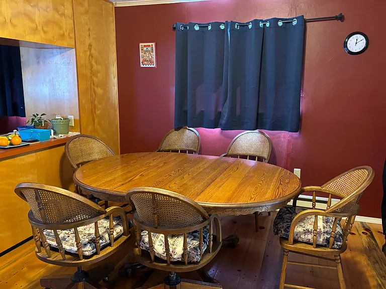 If you rent furnished. This is on the other side of the living room - and pictured here is 1/2 of the large dining room area that is connected to the large kitchen