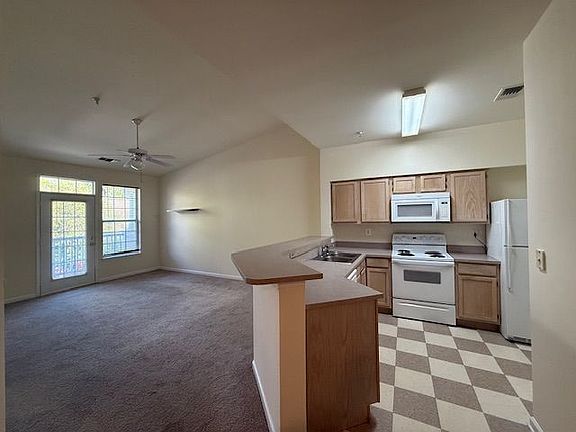 View of kitchen and living room.