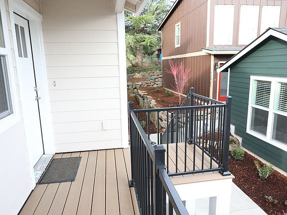 Front deck and surrounding garden area