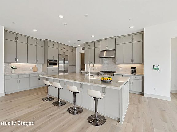 Rooftops Homesite 1001 Kitchen Virtually Staged