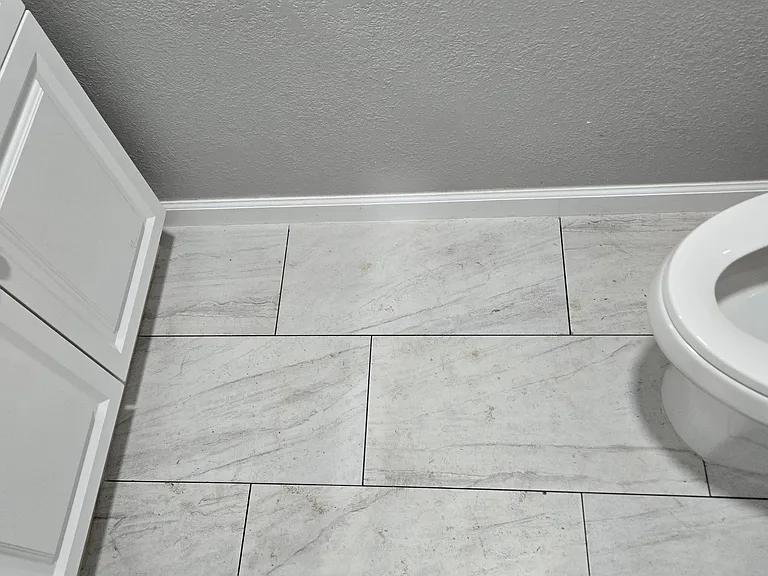New Tile Floors in Media Room Bathroom