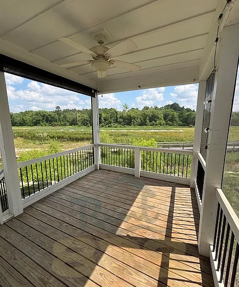 screened-in back porch overlooking creek