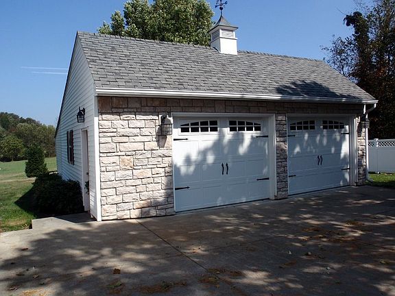 Oversixed 2 car garage w/attached workshop