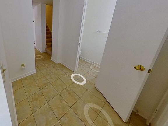 Entrance into home with bathroom to the right