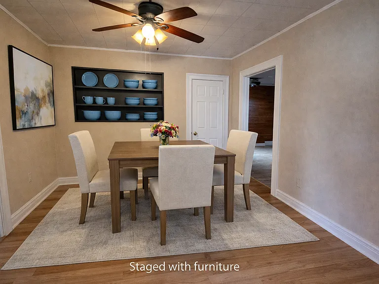 Formal dining room with built-in shelves and closet