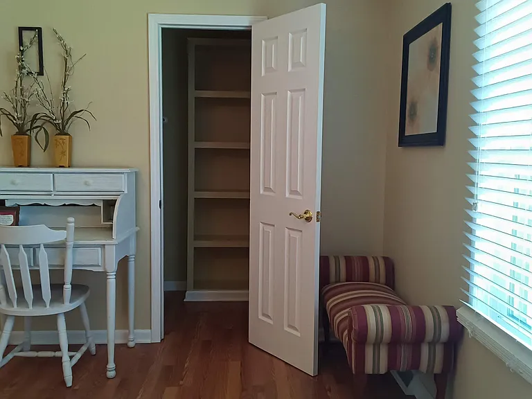 Master Bedroom large walk in closet, small desk and chair