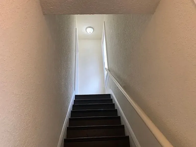 Private entrance/exit (two exist...one on St. John's, one to back property, close to parking)