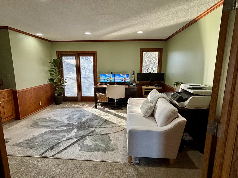2nd living room with French Doors or a private office. Balcony access.
