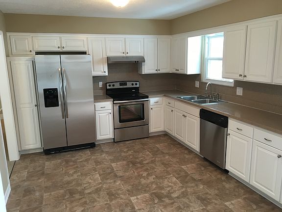 Kitchen with new stainless steel appliances