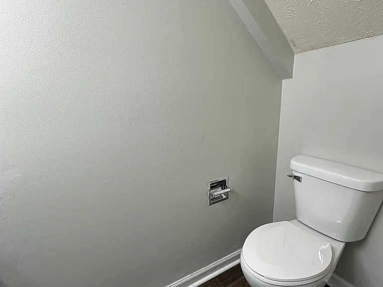 (3-Bedroom 1.5 Bath Unit)- Half Bath - Updated vanity, lighting, new plank flooring, freshly painted.