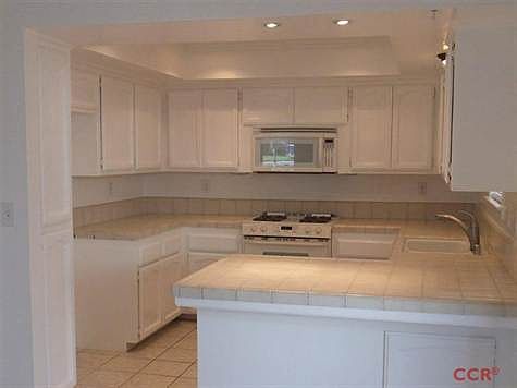 Nice size kitchen with plenty of counter space and cabinets.