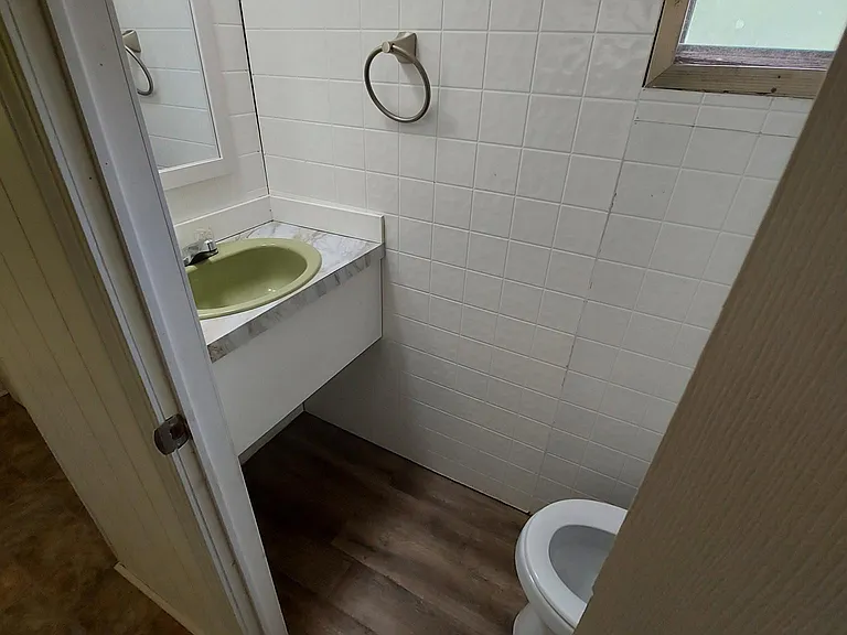 1/2 Bathroom (sink and toilet only) located inside 2nd Bedroom.