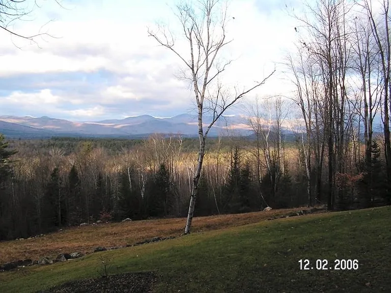 View/ White mountains.
Large yard with fire pit.