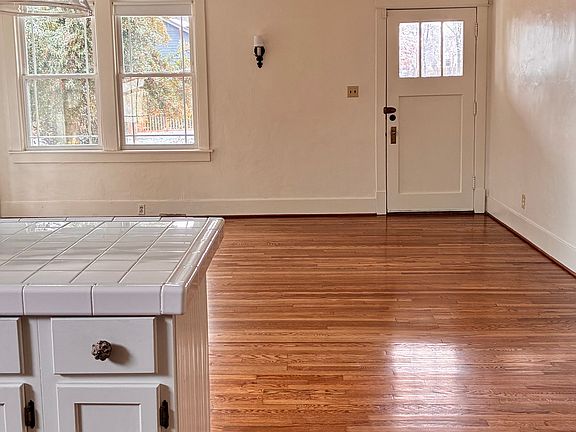 Photo taken from Kitchen area- view is showing living space by front door