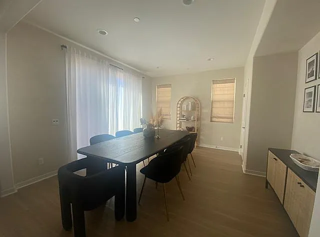 DINING ROOM OFF THE KITCHEN WITH SLIDING PATIO DOORS, LEADING TO HUGE BACKYARD