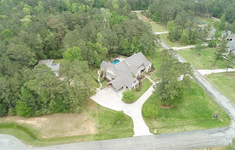 Only 1 real neighbor on this corner of the short CDS street! Gorgeous custom 1.5 Story on approx 2 acres!