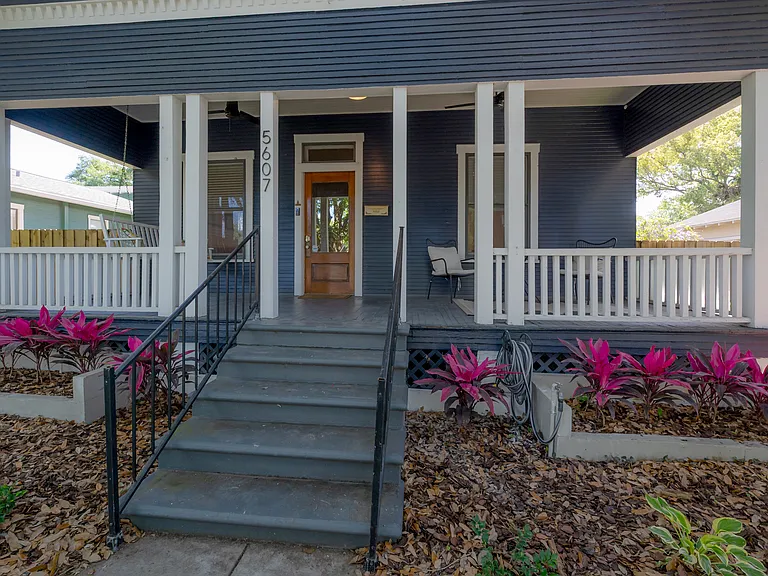 The front porch is a perfect spot for morning coffee or relaxing in the evening.