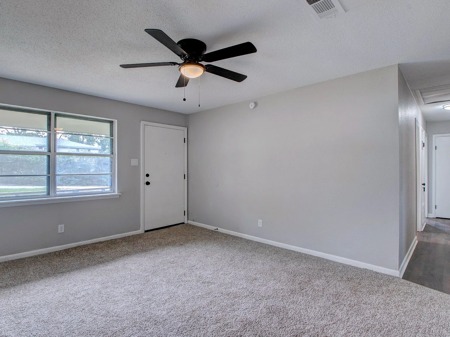 Charming 3-Bedroom Home with Deck & Fenced Backyard — Photo 3