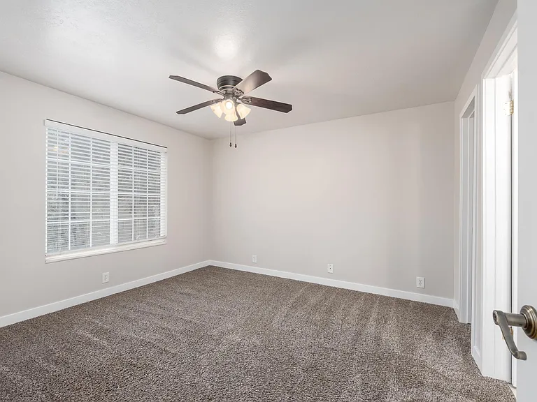 Master bedroom. Bathroom and walk-in closet are on the right.