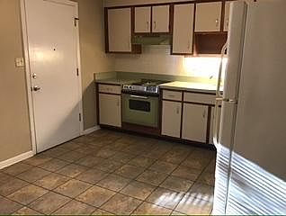 Front door and kitchen.