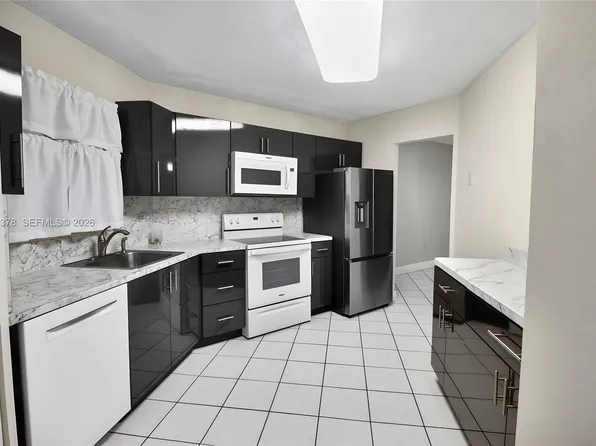 6555 W Broward Blvd APT 303, Plantation, FL 33317