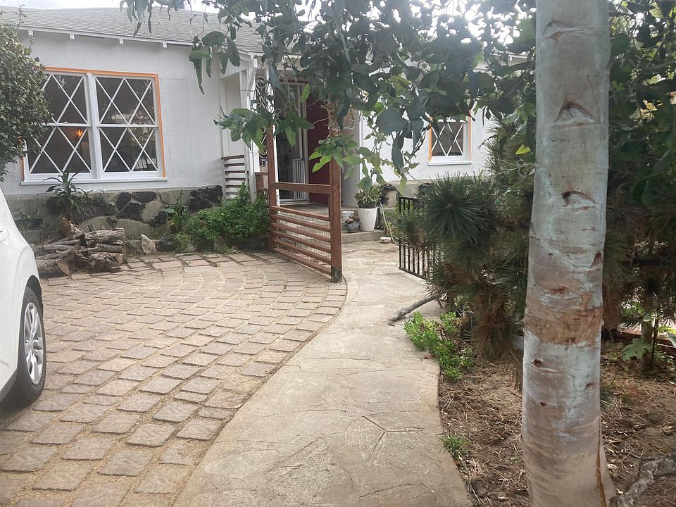 Walk up to house , off street parking / driveway to the left