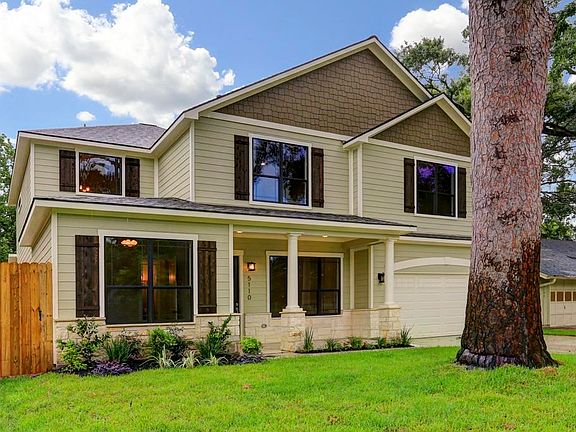This gorgeous Oak Forest home features a double wide driveway and HUGE backyard
