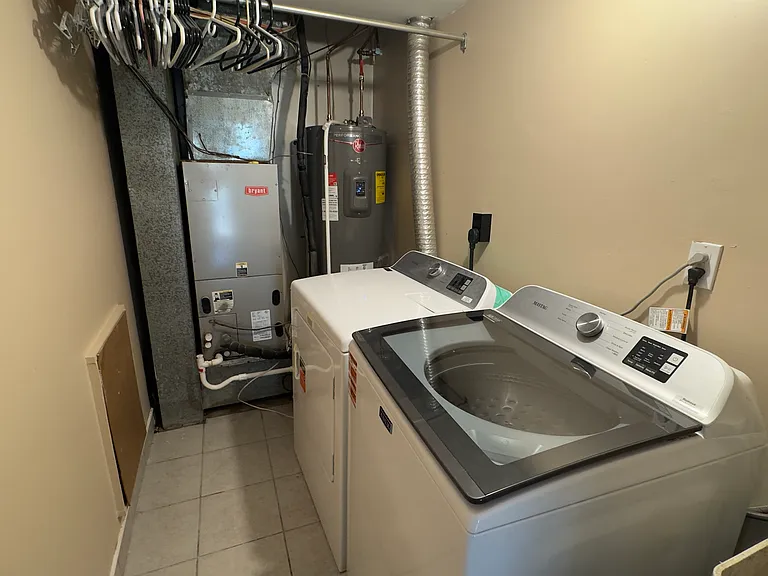 Laundry room - Brand new washer dryer and water heater