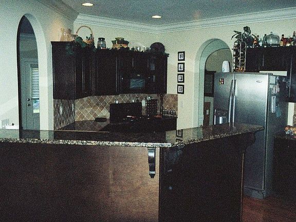 lovely open kitchen with granite counters