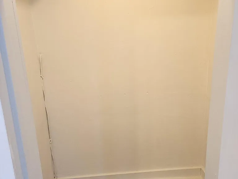 Main bedroom walk-in closet.