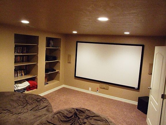 professionally installed theater room comes with equipment