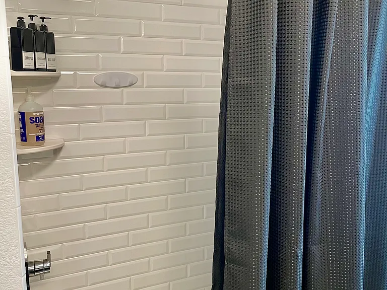 Hall bath tub area & rain shower head