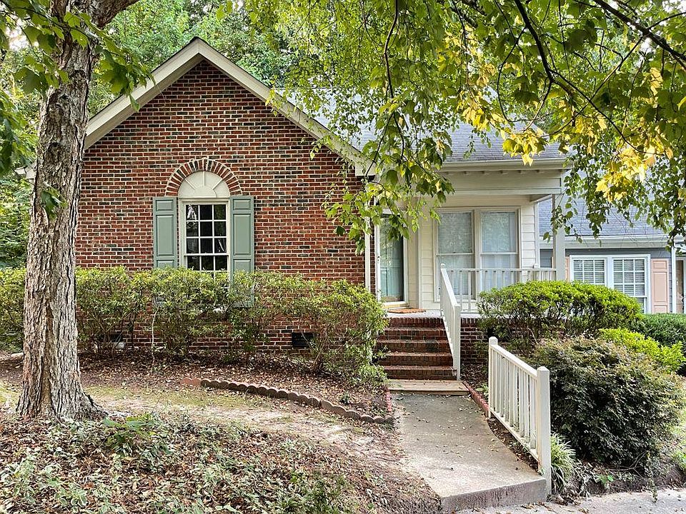 end unit townhome with three other units attached