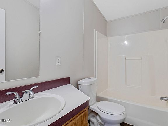 5th image of 10702 N BATTLEFORD Drive