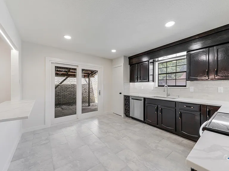Doors to covered side patio