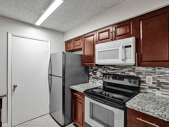 2nd image of 9999 Summerbreeze Dr APT 407