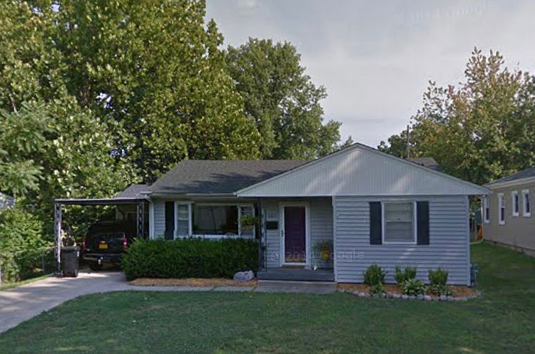 Front of house with carport