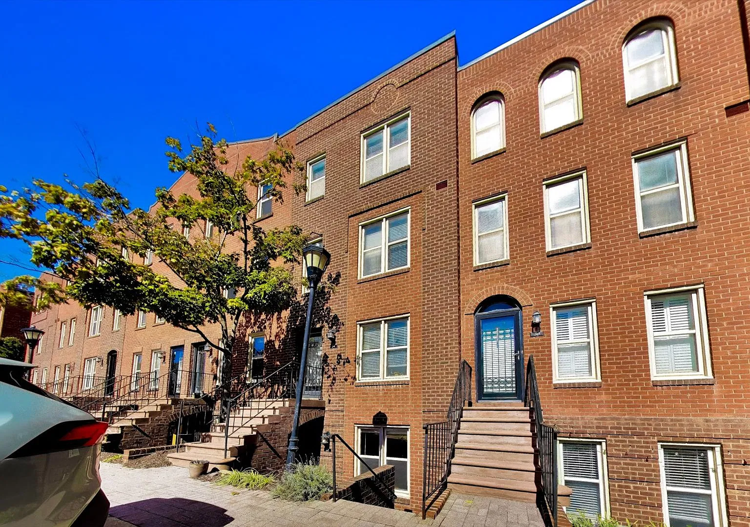 Spacious 709 Sq Ft 1BR with Fireplace & In-Unit W/D at The Car Barn $2,250 + Electric — Photo 1