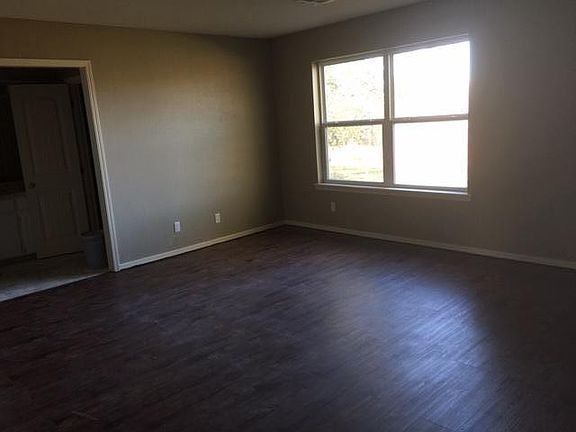 Huge master bedroom with sitting area, bathroom with double sinks and walk in closet